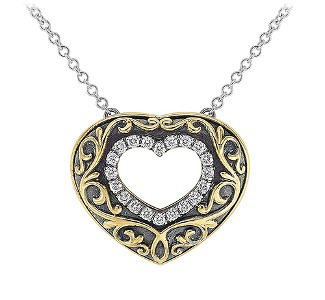 Black and gold filigree scroll details on an open heart pendant with diamonds lining the opening by Jack Kelege