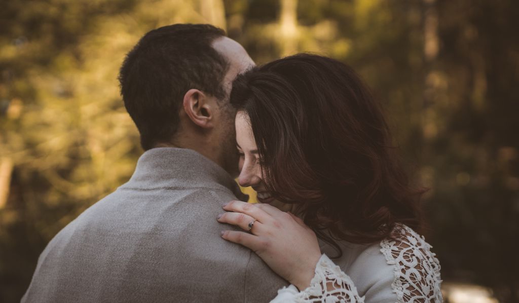 Couple embracing in the outdoors