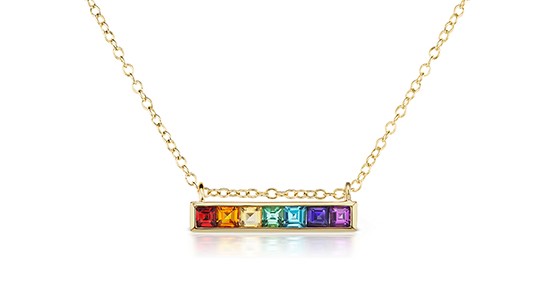 A yellow gold bar necklace featuring seven gems arranged in rainbow order, available at Frank Adams Jewelers.