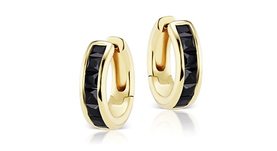 A pair of yellow gold huggies by Jane Taylor set with black spinel, available at Frank Adams Jewelers.