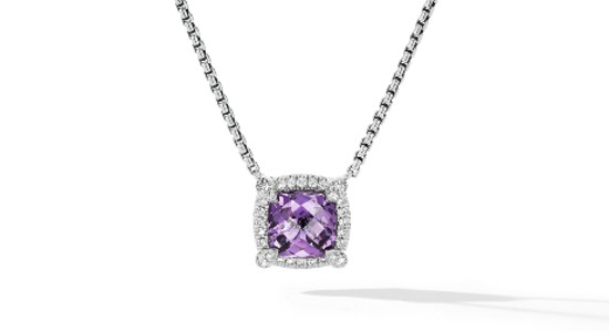 a white gold necklace featuring an amethyst pendant