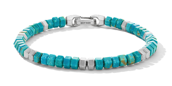 a beaded turquoise bracelet with a silver toned clasp