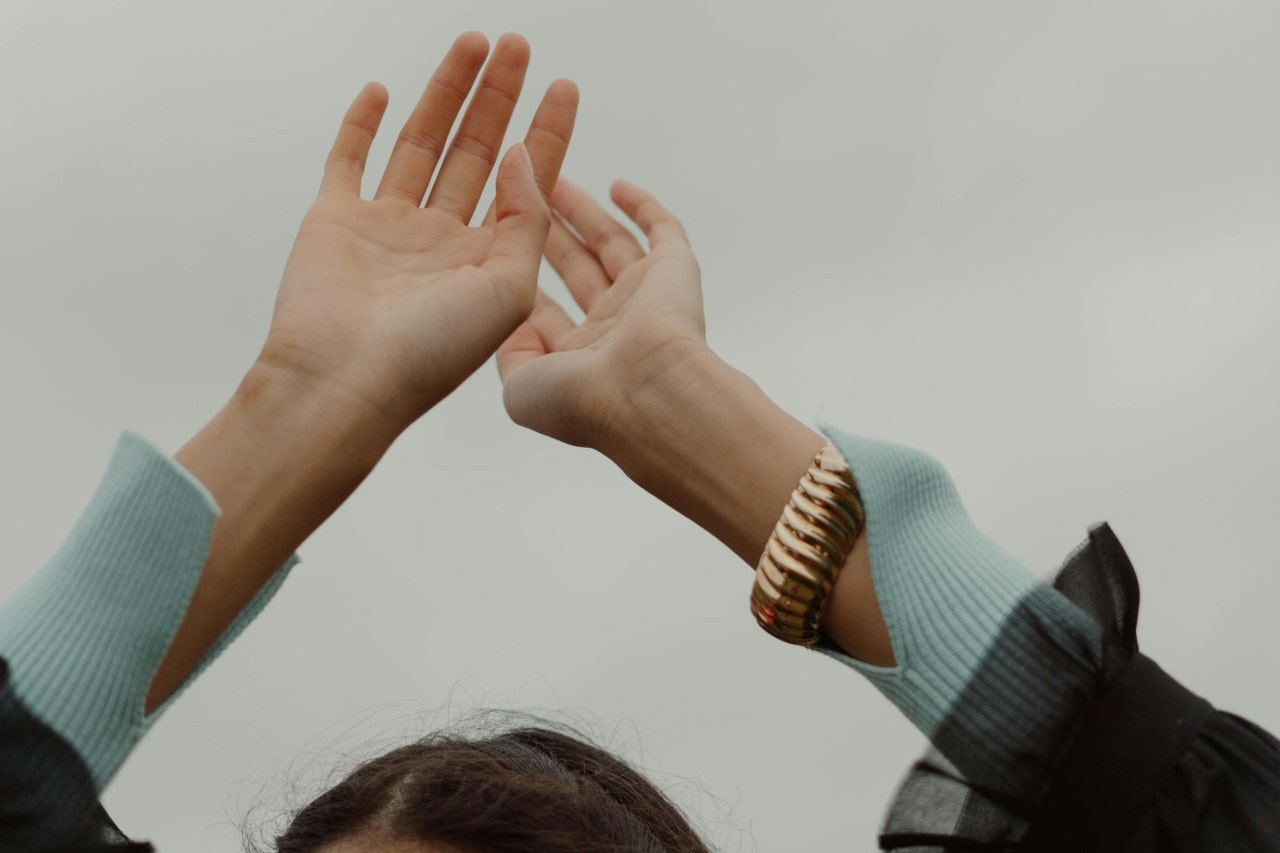 woman with cuff bracelet at Frank Adams Jewelers